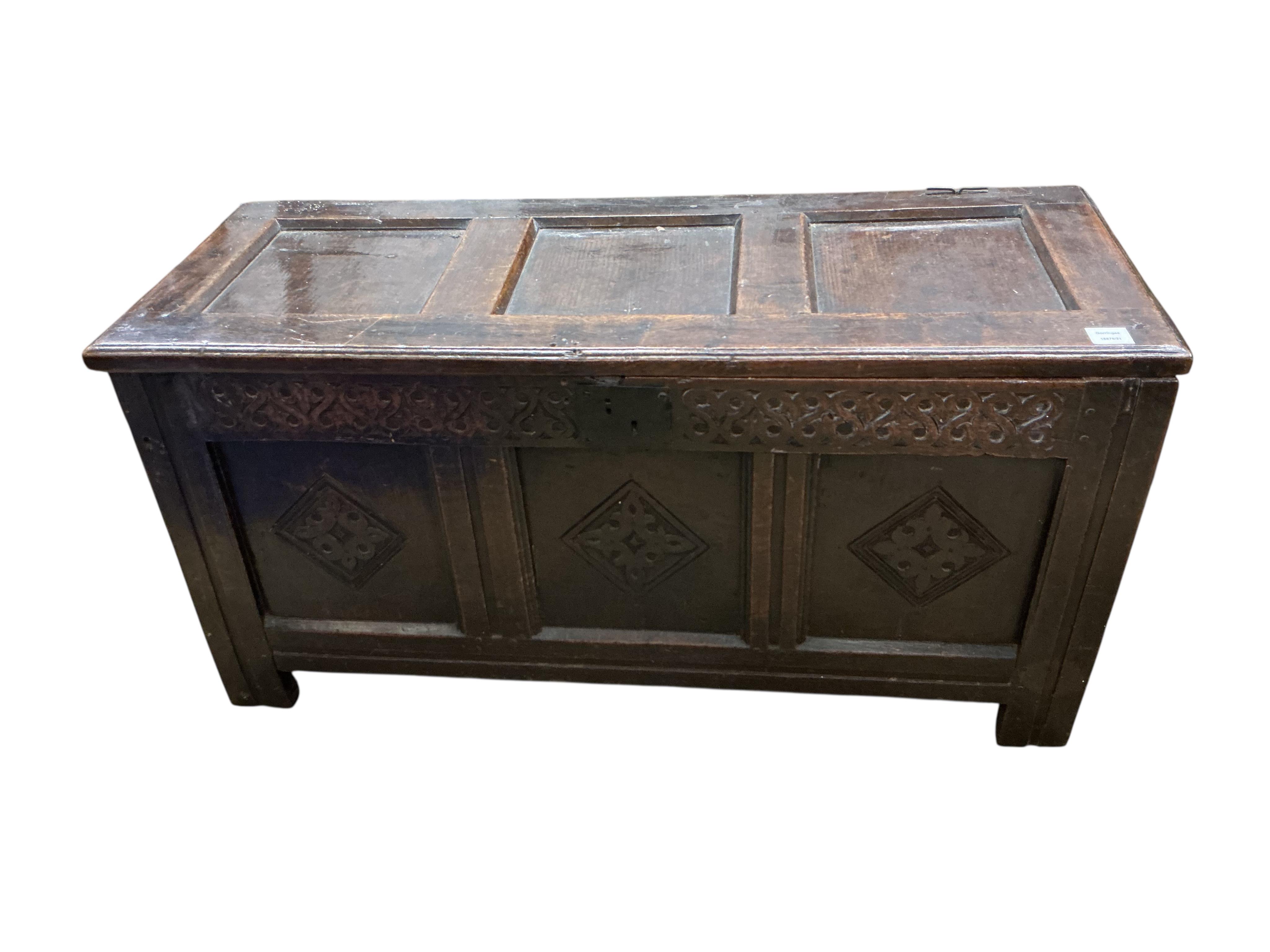 A late 17th century oak triple panelled coffer, width 116cm, depth 44cm, height 58cm